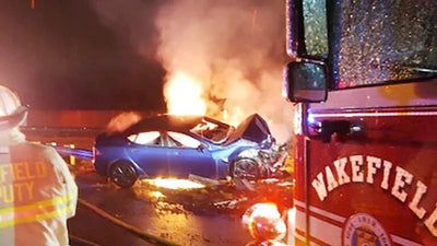 A Tesla catches fire and burns after a collision on the Wakefield Interstate